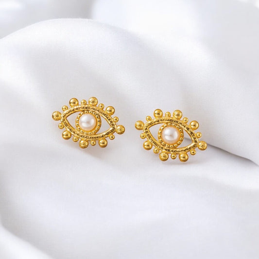 Boucle d'oreille œil blanc