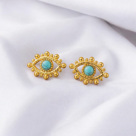 Boucle d'oreille œil vert